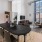 Large dining area adjacent to the kitchen with a large bar 