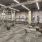 Large fitness center with cardio and weight lifting equipment.