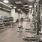 Large fitness center with cardio and weight lifting equipment.