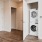 Large well lit laundry area with full size washer and dryer and large closet space