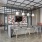 Spacious and well lit clubhouse with bar seating and ample chairs for entertaining.